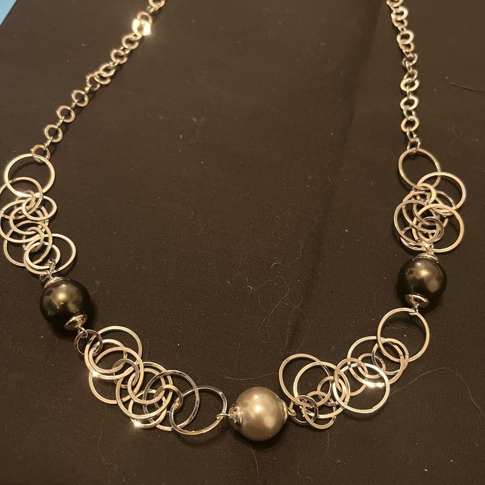 Modern Silver and faux pearl necklace.